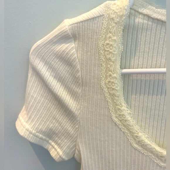 Forever 21 bodysuit with white floral pattern around neck. - Picture 5 of 5